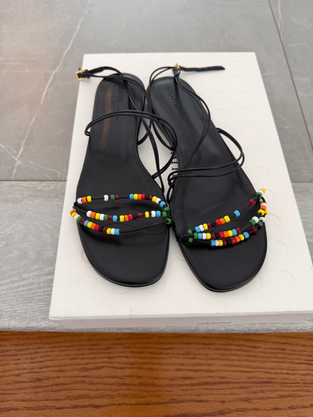KHAITE Black Leather Strappy Sandals with Multicolor Seed Beads